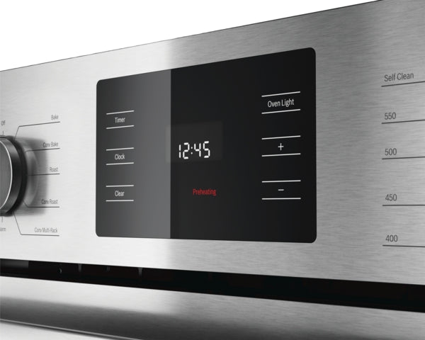 Close-up of stainless steel wall oven digital control panel with timer, oven light, and temperature settings from kitchen appliances collection