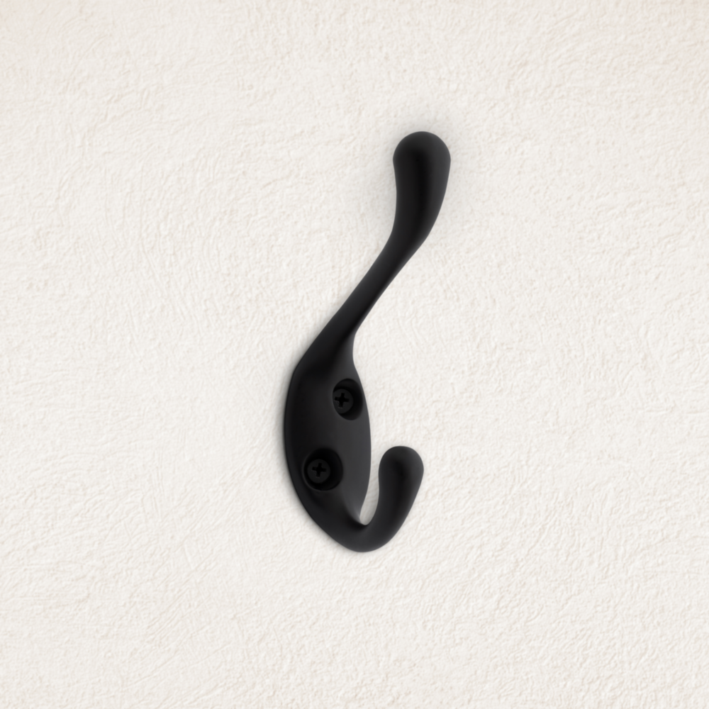 Matte black heavy-duty dual-prong coat hook with secure mounting screws in door and window accessories under $50 collections