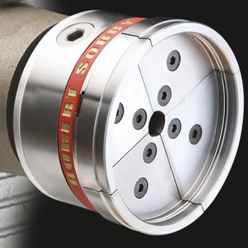 Metal chuck jaws with hex screws and red branding band, designed for woodworking tools and accessories collection