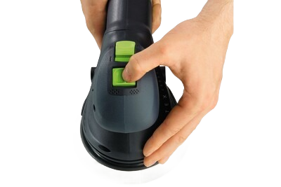 Hand holding a Festool multi-mode sander with green power button for tools and home improvement use
