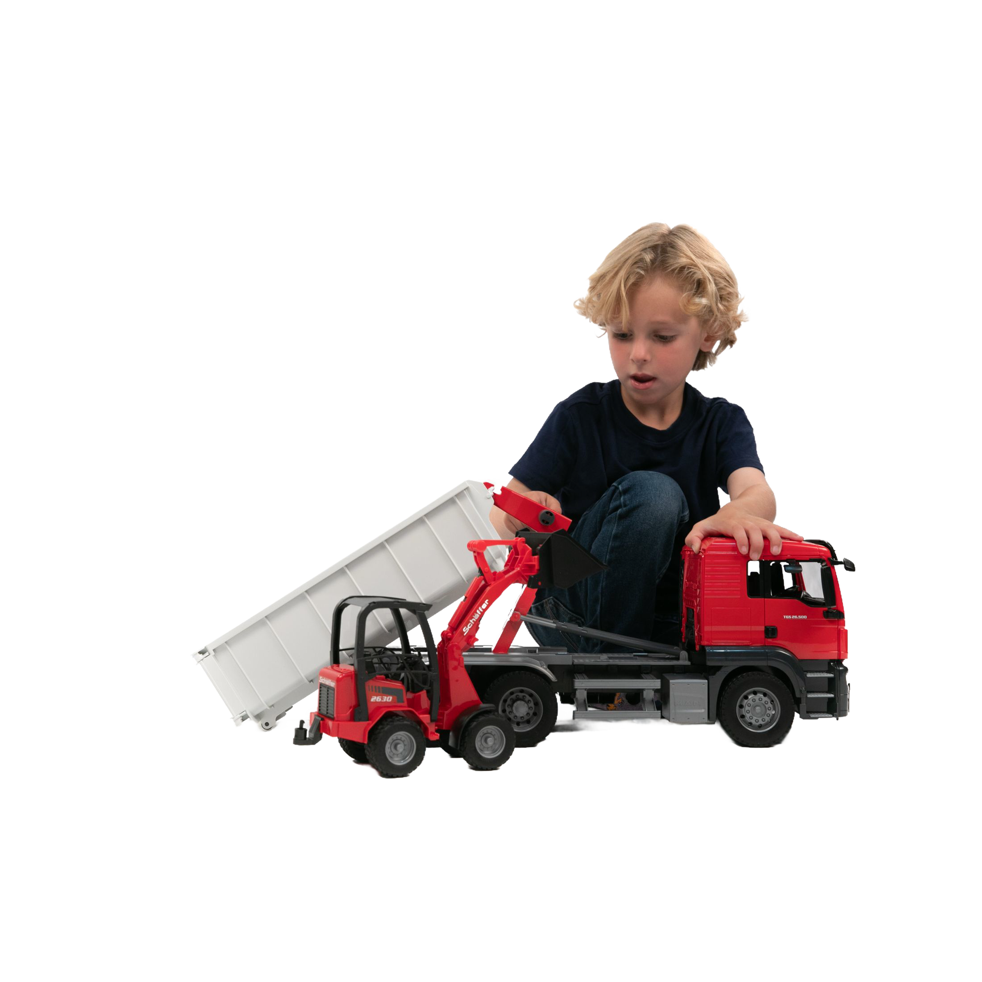 Child playing with red Bruder toy truck and compact loader in Vehicles & Remote Controlled Toys and Bruder Toys collections