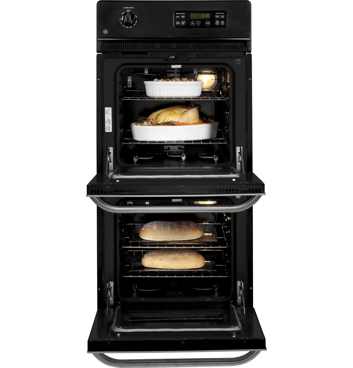 Open black double wall oven with baked turkey and bread inside, part of kitchen appliances and wall ovens collection
