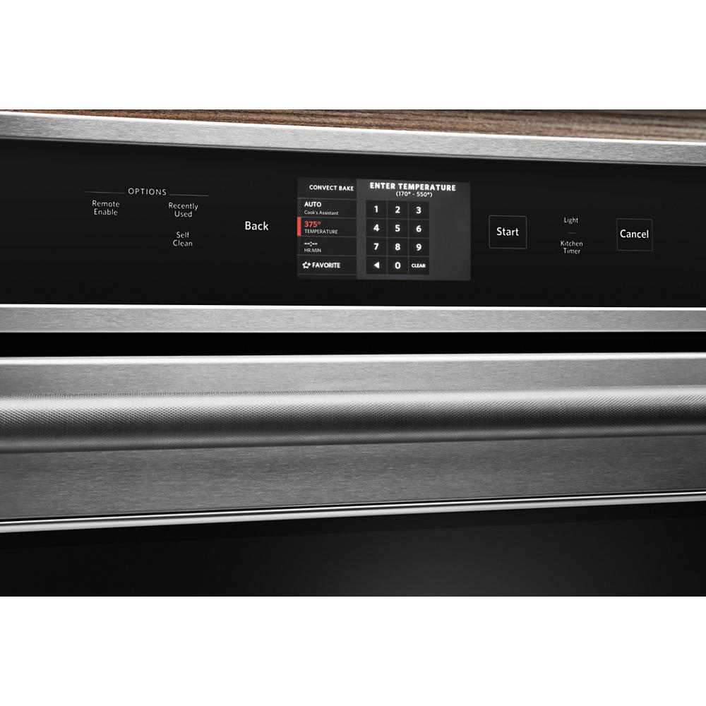 Close-up of stainless steel oven digital control panel with touchscreen and temperature settings in modern kitchen appliances collection