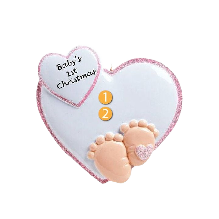 Heart-shaped Christmas ornament with pink baby feet and "Baby’s 1st Christmas" message in holiday decorations under $50