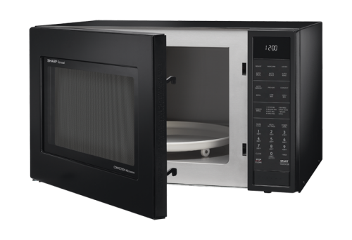 Black countertop convection microwave oven with open door showing interior and control panel in kitchen appliance setting