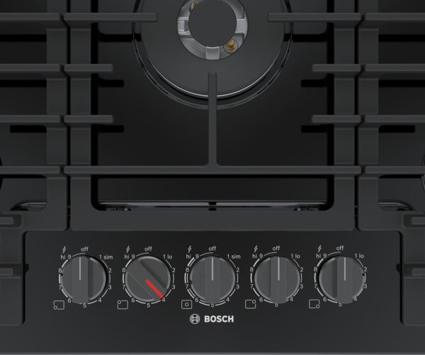 Black Bosch gas cooktop with five control knobs and sturdy cast iron grates from appliances and cooktops collection