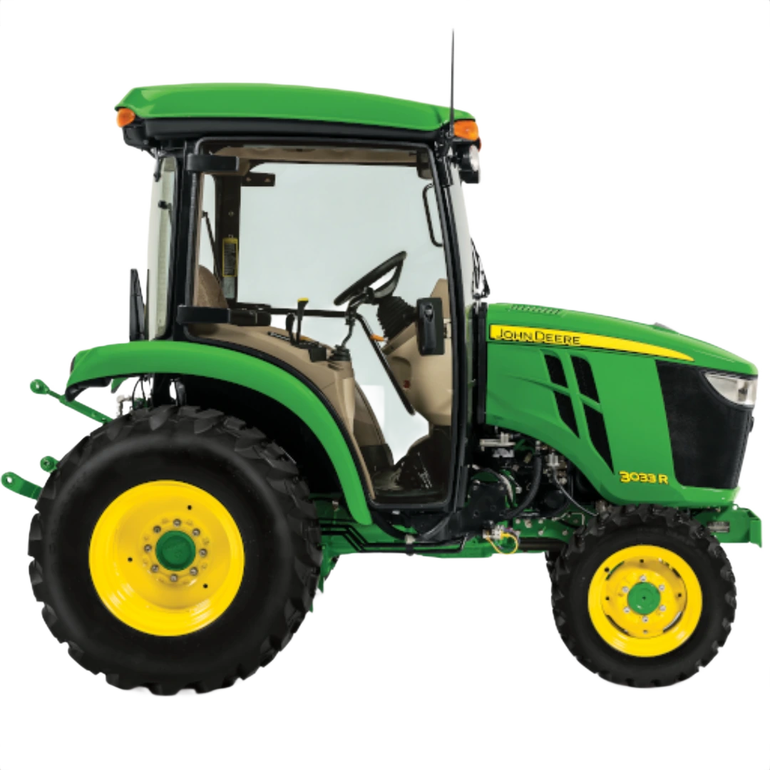 Side profile of John Deere 3033R compact tractor with ComfortGard cab, green and yellow design, featured in Outdoor Power Equipment at Hartville Hardware