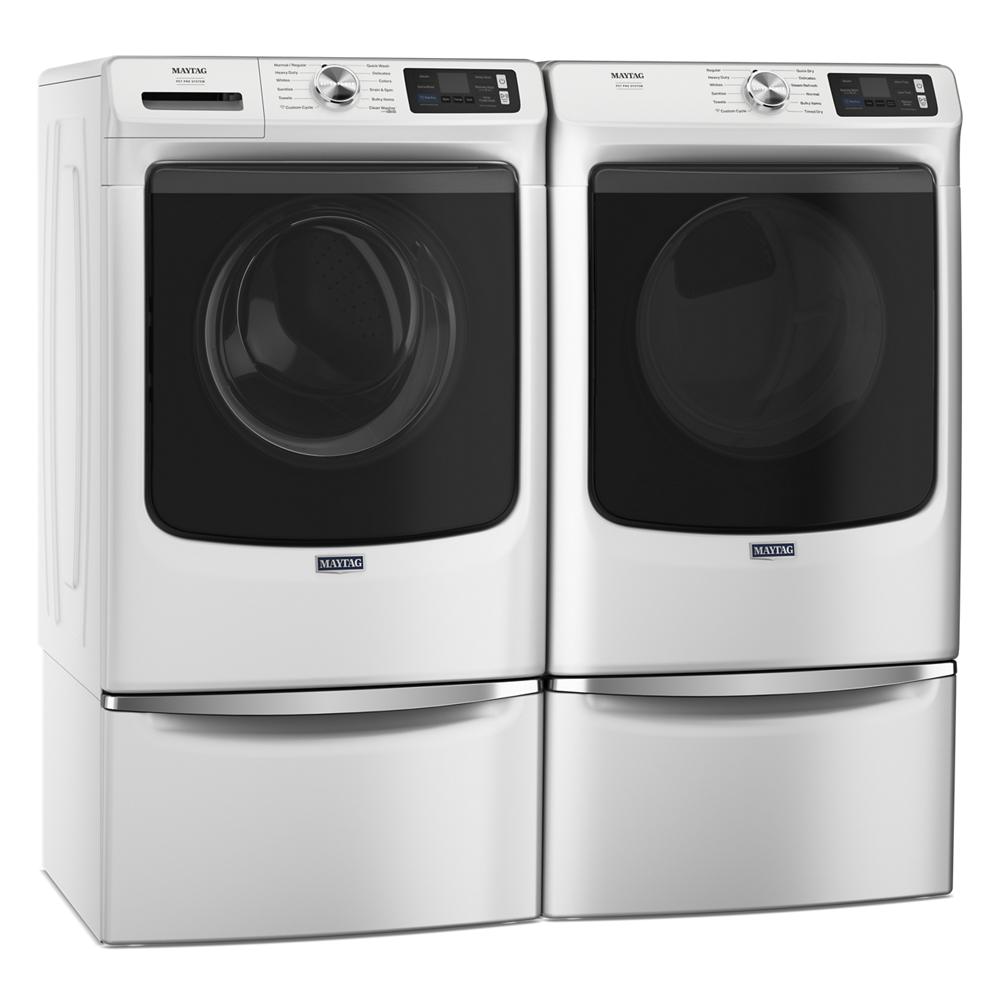 Pair of white front load washer and dryer with digital controls and pedestal drawers from washers and dryers collection