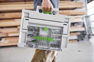 White and green Festool tool storage box with transparent lid compartment holding drill bits for workshop organization and tool storage