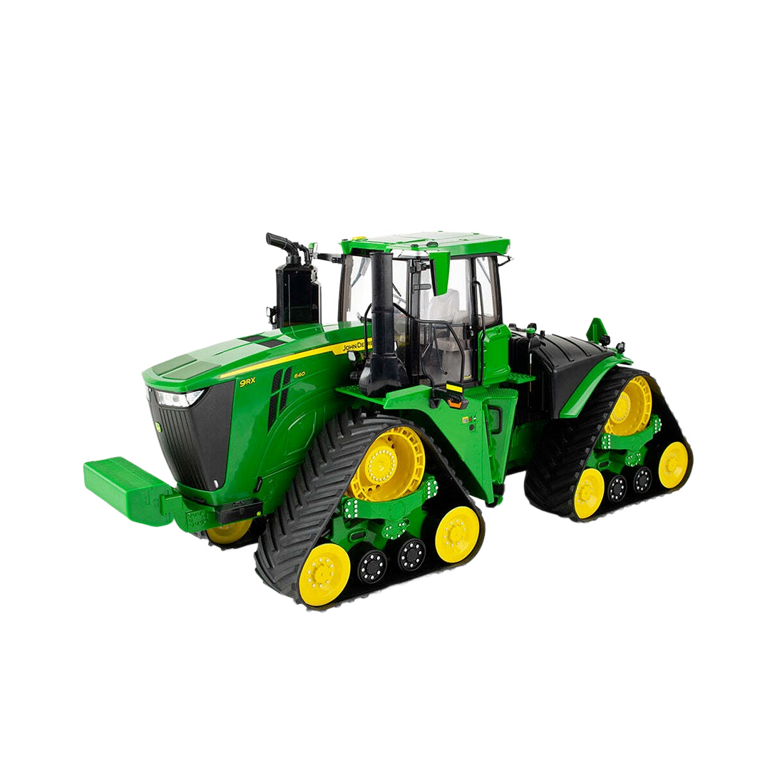 Green and yellow John Deere toy tractor with rubber tracks and detailed cabin from the Prestige Collection