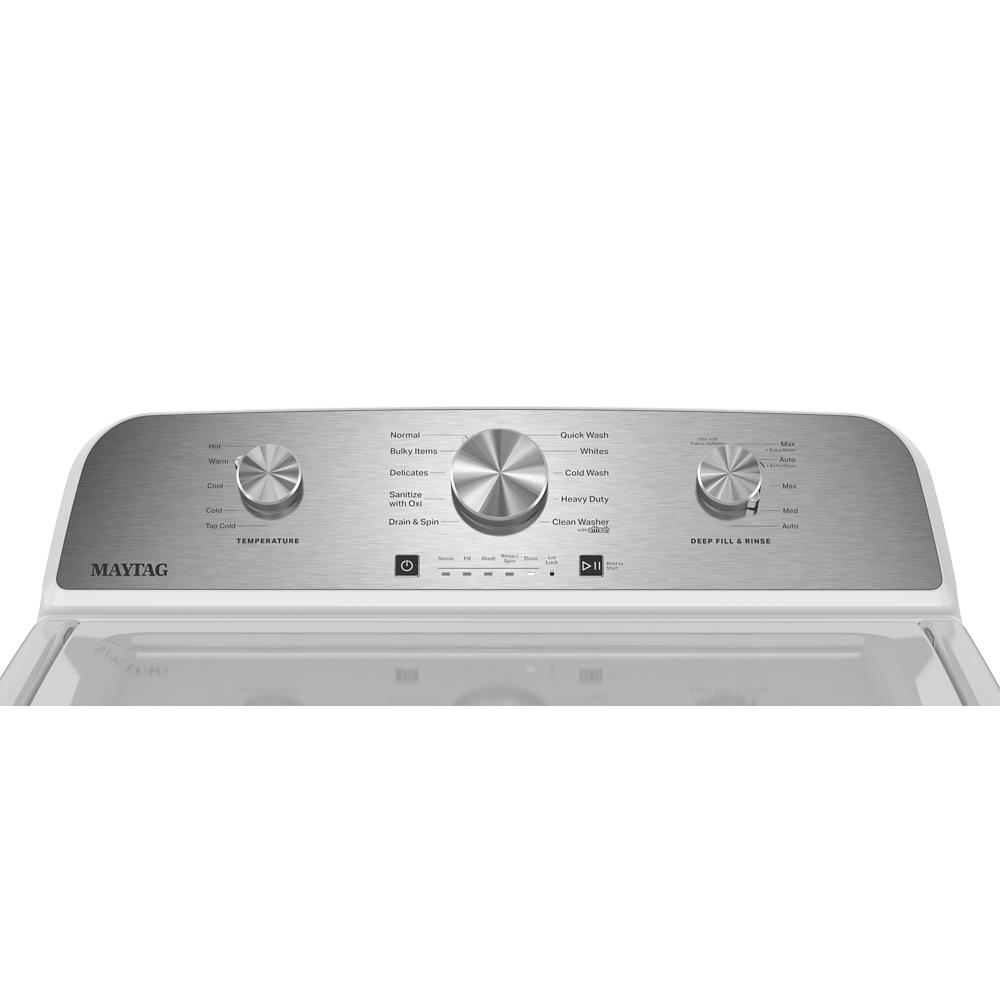 Silver control panel with three knobs and buttons for wash cycles and water temperature on top load washer