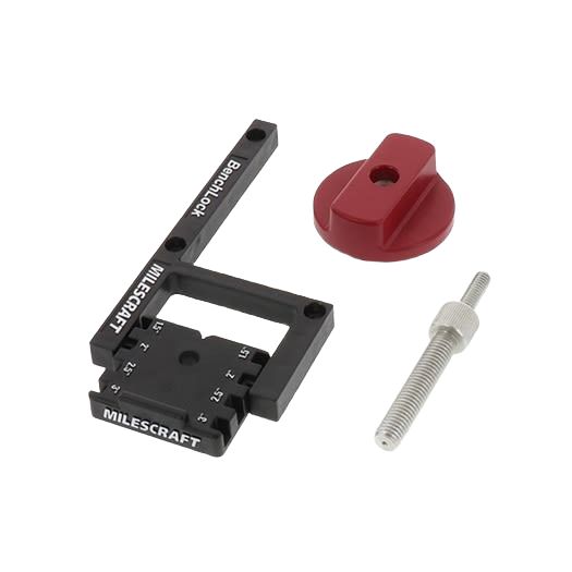Black plastic woodworking clamp with measurement markings, red adjustment knob, and metal threaded bolt for home improvement.
