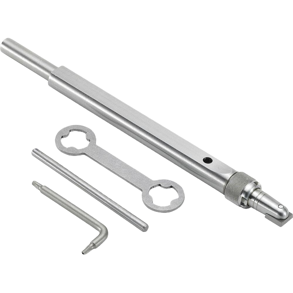 Metal TurnMaster shank with square cutter, accompanying wrench, hex key, and small metal rod for tool adjustments