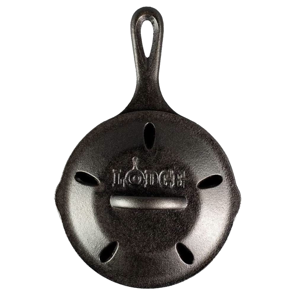 Top view of a 6.5-inch cast iron smoker skillet with vent holes, part of Kitchenware and Lodge Cast Iron collections
