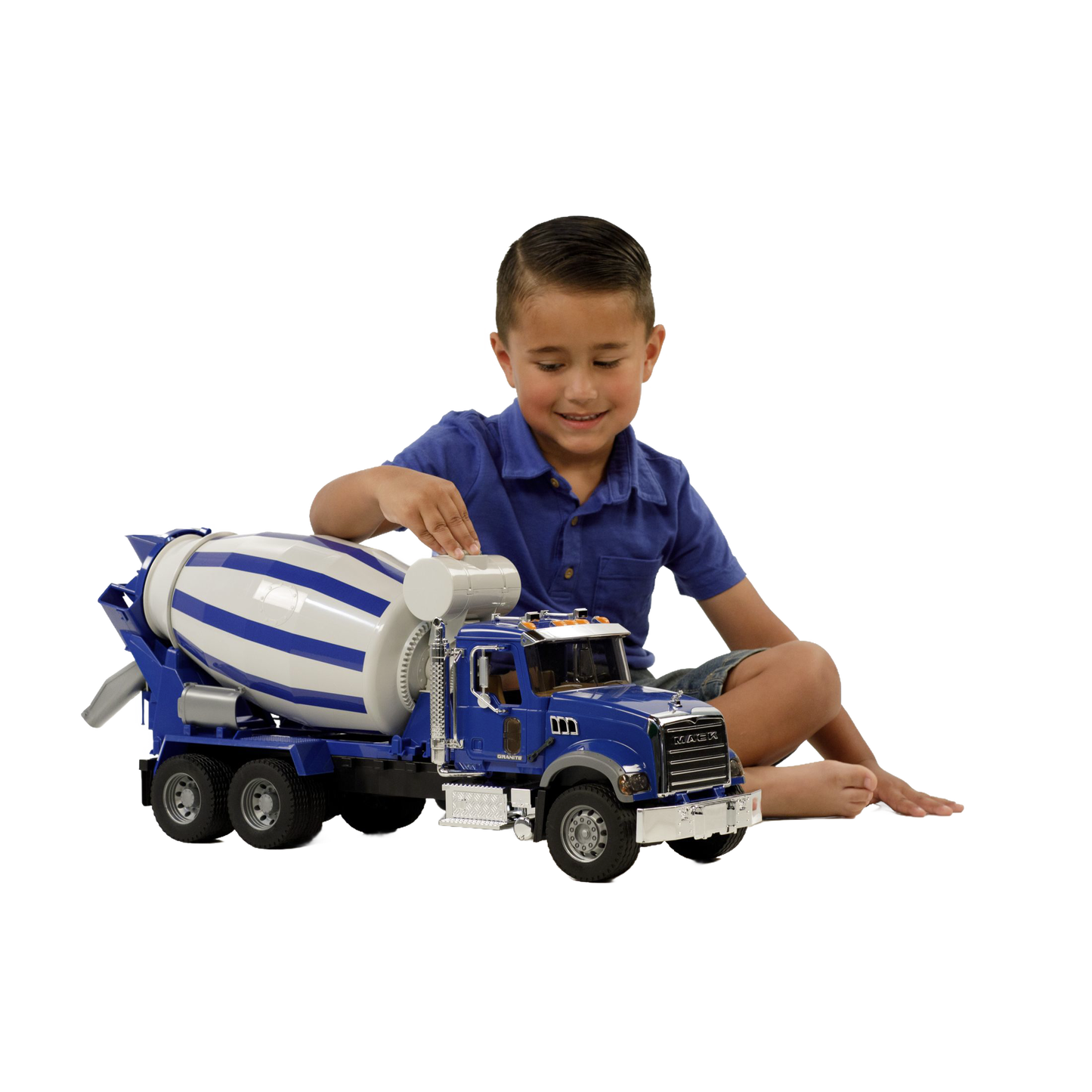 Child playing with detailed blue Bruder 1:16 scale Mack Granite cement mixer truck from Vehicles & Remote Controlled Toys collection