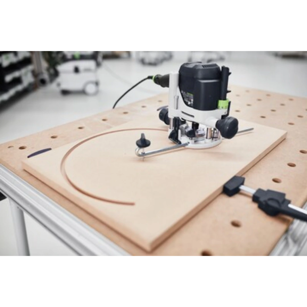 Festool router with trammel unit creating precise circular cuts on wood in power and woodworking tool accessories collections