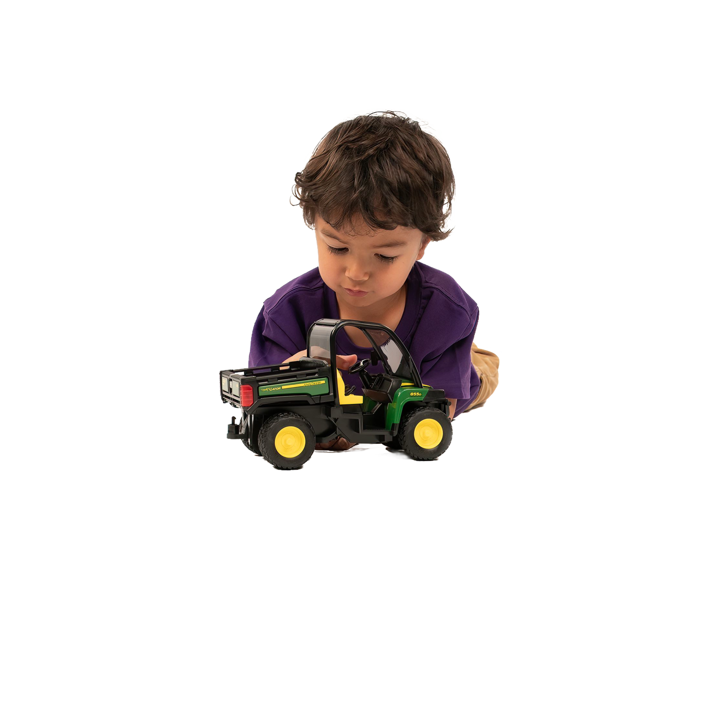Child playing with a green and yellow Bruder Toys John Deere Gator from the Vehicles & Remote Controlled Toys collection