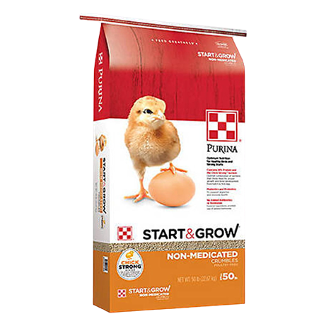 Bag of Purina poultry feed with image of chick and egg labeled non-medicated crumbles for young birds growth