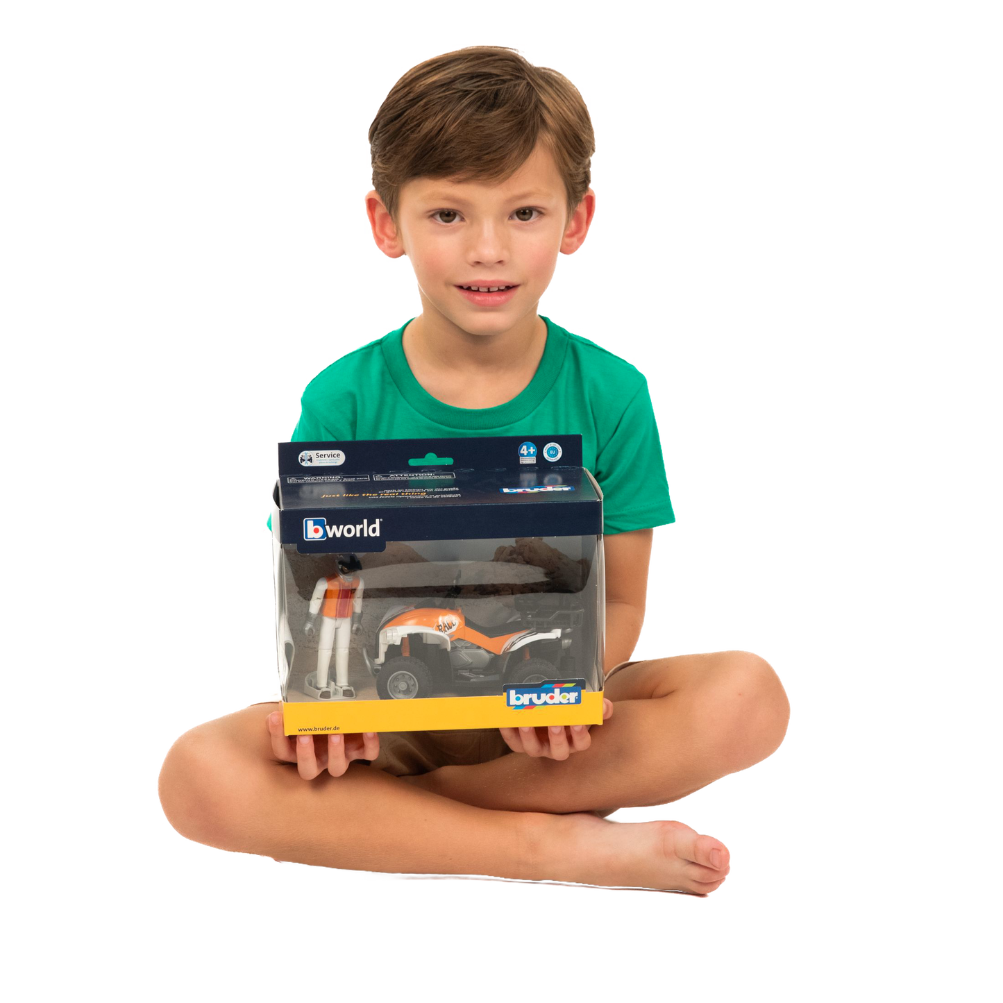 Child holding boxed Bruder Quad Bike with Driver toy from Vehicles & Remote Controlled Toys and Bruder Toys collections