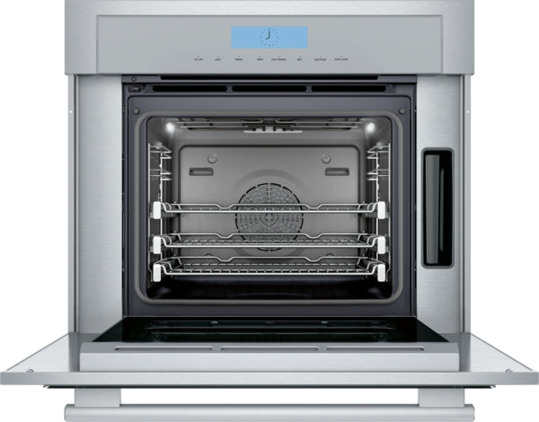 Open stainless steel wall oven with digital control panel and multiple racks in Thermador kitchen appliances collection