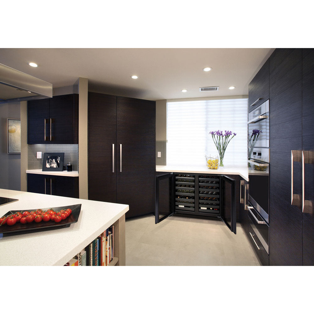 Modern kitchen with built-in wine chiller, dark wood cabinetry, white countertops, and integrated appliances in appliances collection
