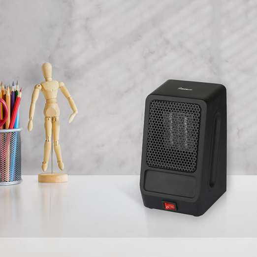 Compact black personal ceramic heater with mesh front and red power switch in Under $50 and All Products collections
