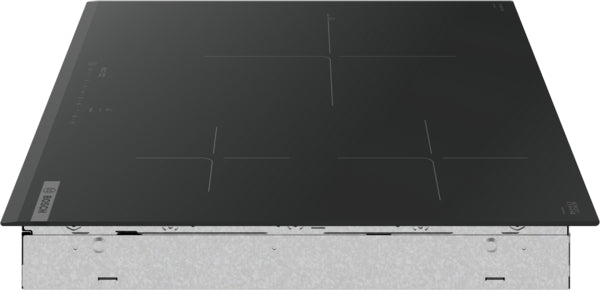 Sleek black Bosch 24-inch induction cooktop with four heating zones designed for modern kitchen appliances and home improvement