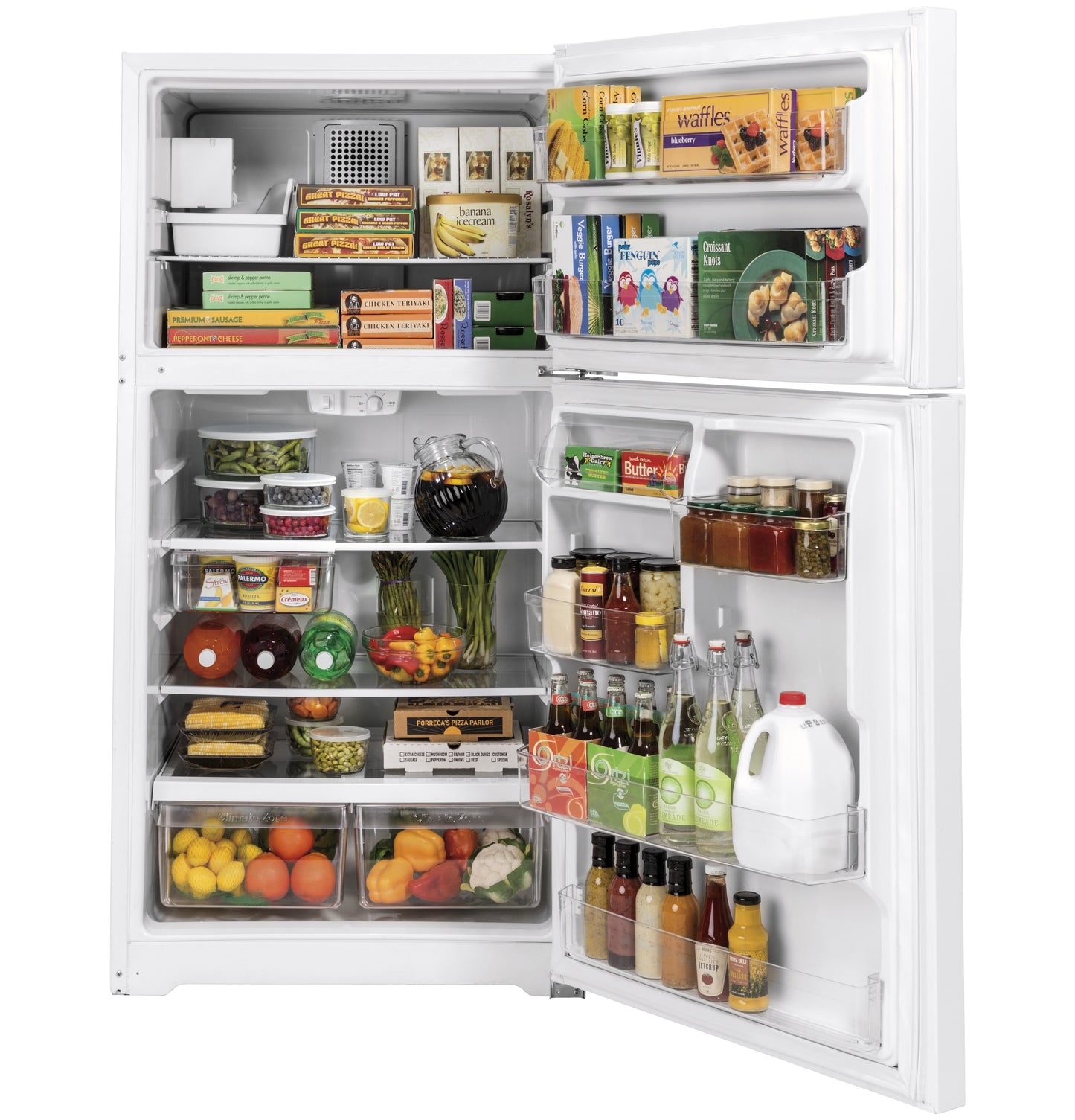 Open white top freezer refrigerator filled with assorted groceries and beverages in Appliances and Refrigerators collections