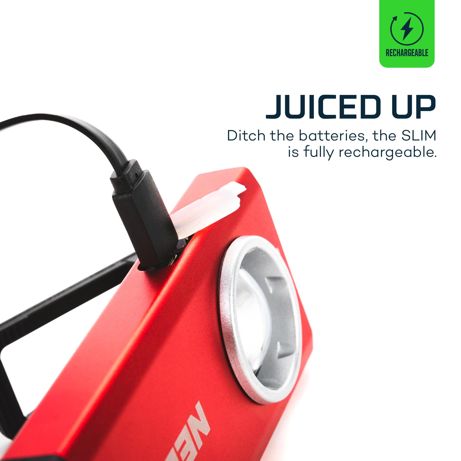 Close-up of red rechargeable LED pocket light connected to USB charging cable for tools and home improvement projects