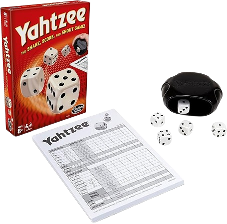 Red Yahtzee game box with dice, black dice cup, five white dice, and a scoring sheet on white background