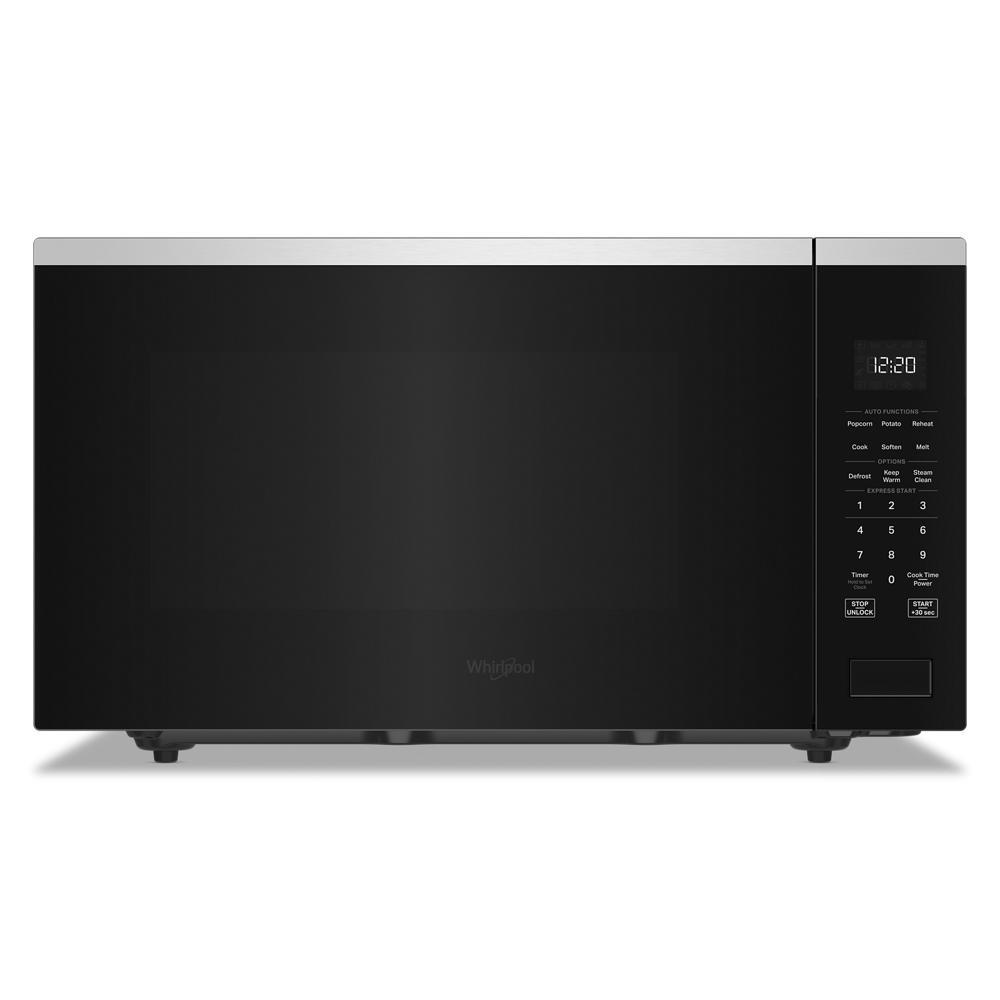 Black sensor cooking microwave with digital control panel and stainless steel trim in kitchen appliances collection