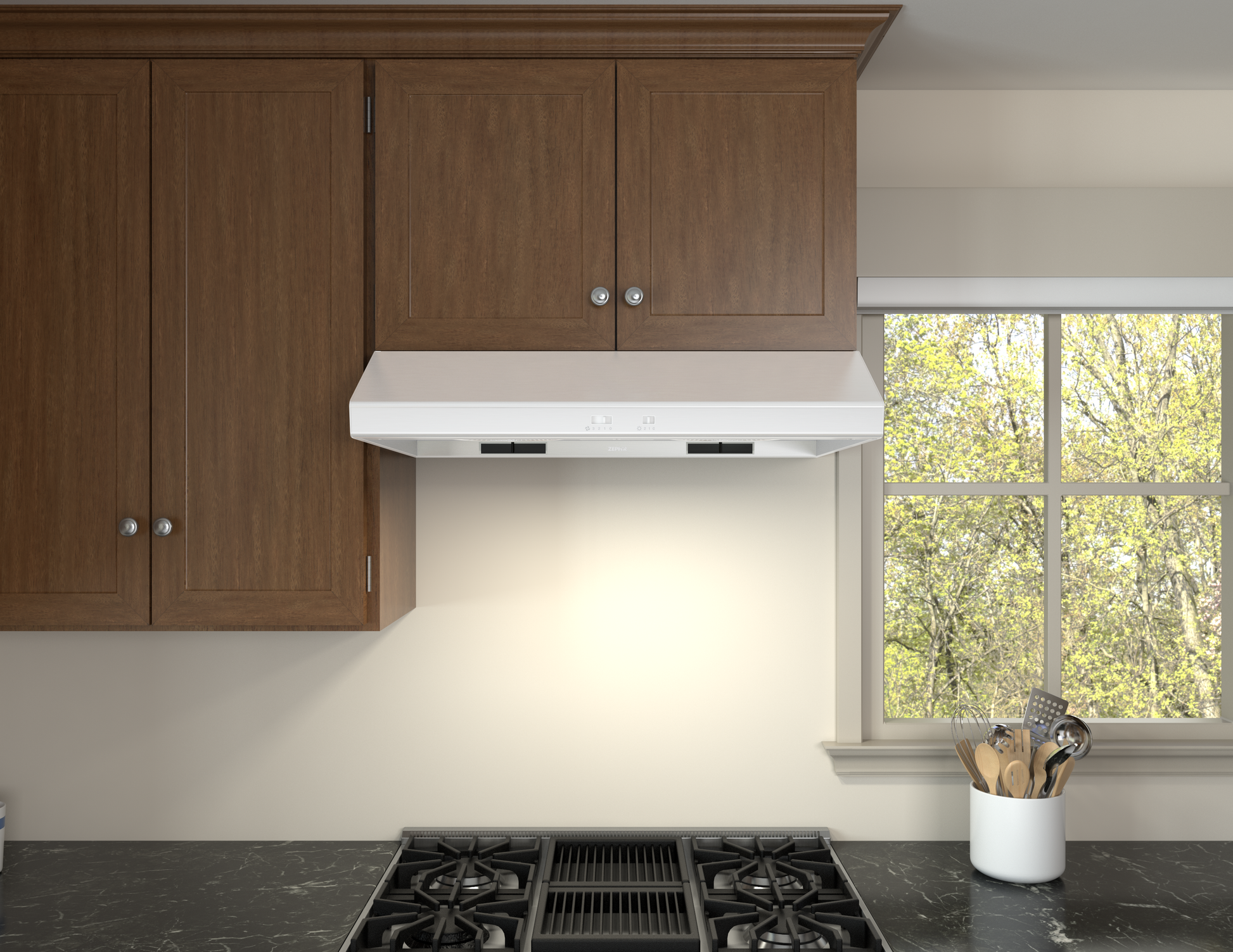 White under-cabinet range hood with LED lighting and 600 CFM blower, installed above a black gas cooktop in a kitchen with wood cabinetry and a window view, part of Under Cabinet Range Hoods, Kitchen & Kitchenware, All Products, and Appliances collections.