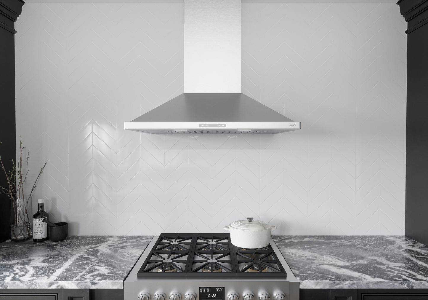 Stainless steel pyramid chimney hood with LED lighting above gas range in kitchen for home improvement collections