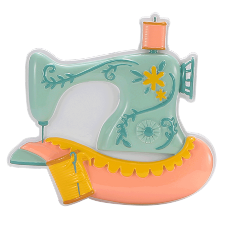 Blue vintage sewing machine ornament with pink fabric and yellow thread in Christmas decorations under $50 collection