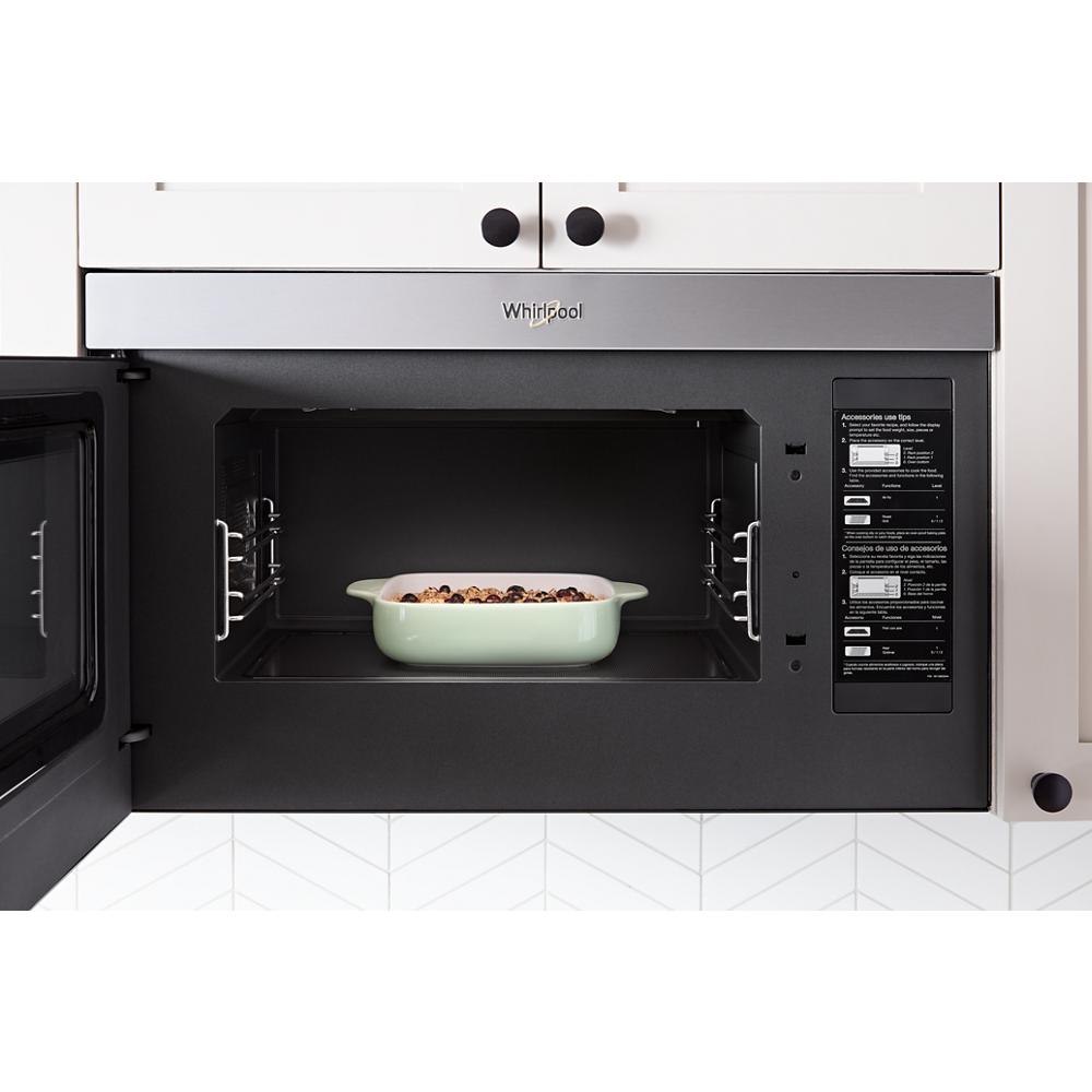 Open built-in stainless steel air fry microwave with casserole dish inside from kitchen appliances collection
