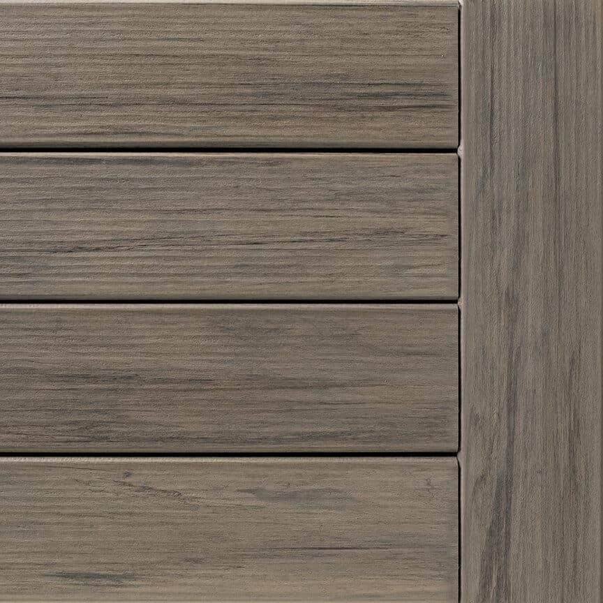 Corner view of grooved Ashwood deck boards from TimberTech Legacy Collection for outdoor decking and building materials
