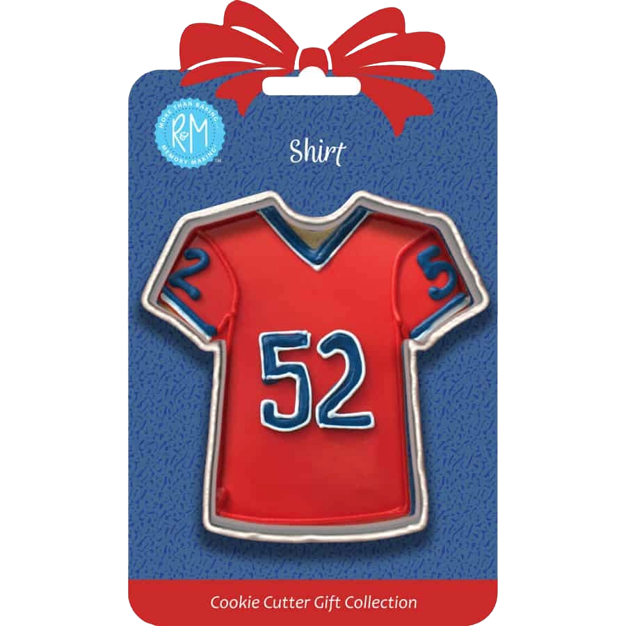 Tinplated steel shirt-shaped cookie cutter in packaging with red and blue design, part of kitchen gadgets and bakeware.