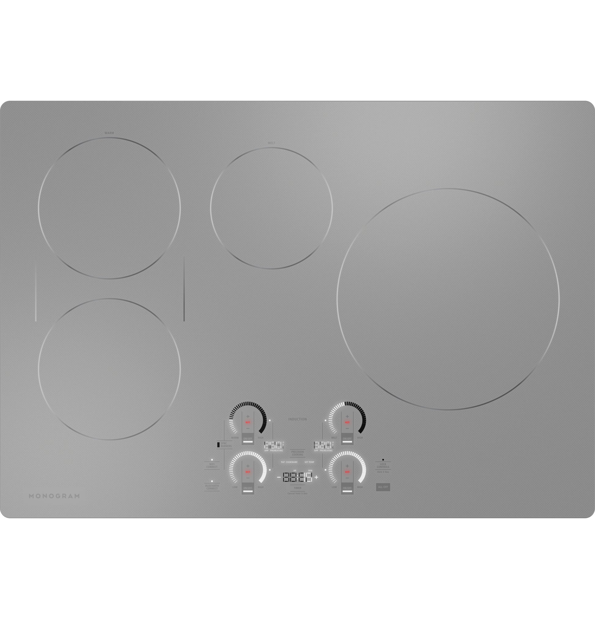 Stainless steel induction cooktop with digital touch controls and four heating zones in appliances and cooktops collection