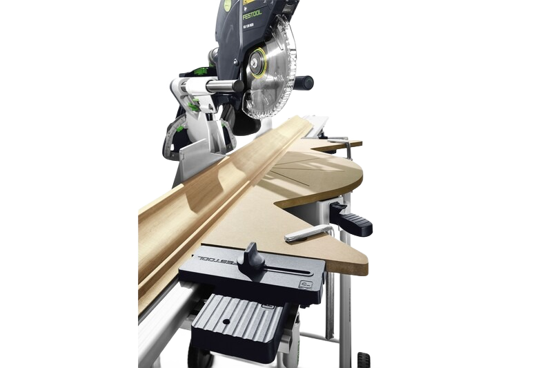 Festool Kapex sliding compound miter saw with crown stops supporting angled wood molding in saw accessories collection
