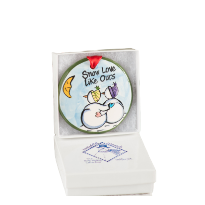 Hand-painted ceramic Christmas ornament with snowmen, moon illustration, and "Snow Love Like Ours" text in gift box