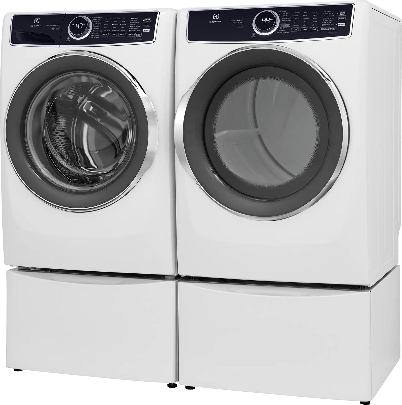 White front load washer and dryer set with digital controls and large circular doors, part of washers and dryers collection