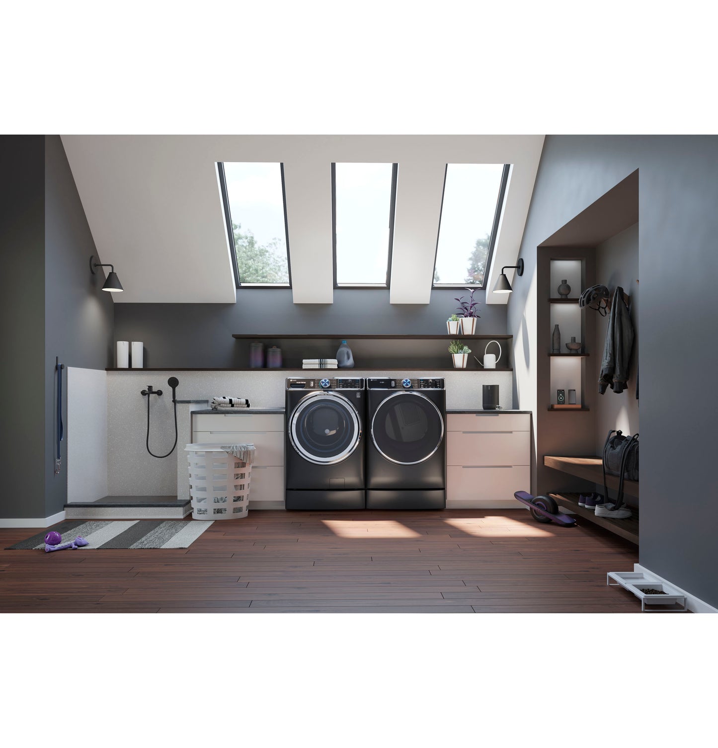 Modern laundry room with black front load washer and dryer on 7-inch riser surrounded by Appliance Parts & Accessories