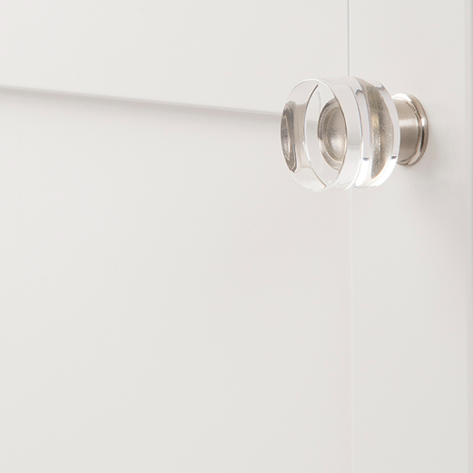 Clear acrylic knob with satin nickel base on white cabinet, ideal for furniture hardware and home improvement projects under $50
