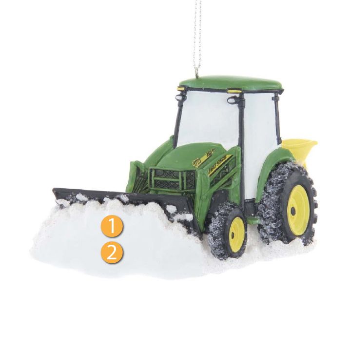 Green and yellow tractor ornament with snow plow clearing white snow detail and hanging string attachment