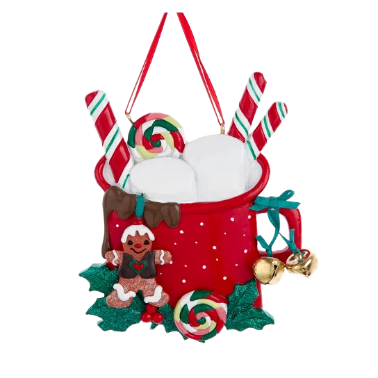 Festive red mug ornament with marshmallows, candy canes, gingerbread figure, holly leaves, and golden jingle bells hanging decoration