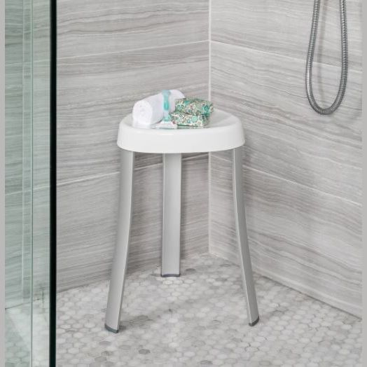 White three-legged shower chair with curved legs for bathroom safety and accessibility under $50 in bath collection