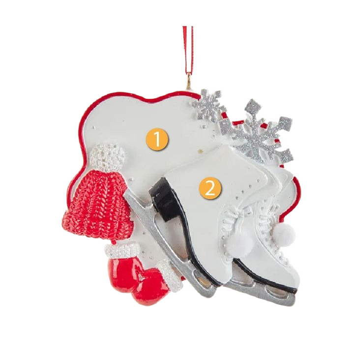 Christmas ornament featuring white ice skates with silver snowflakes and a red knitted hat for holiday decorating collections