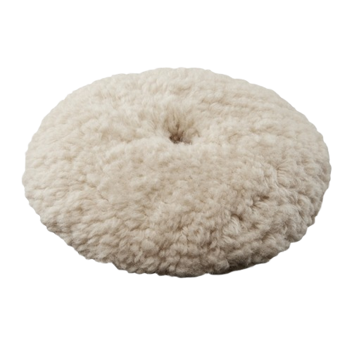 Cream-colored wool polishing pad for sanding, finishing, and polishing in woodworking and home improvement tools.