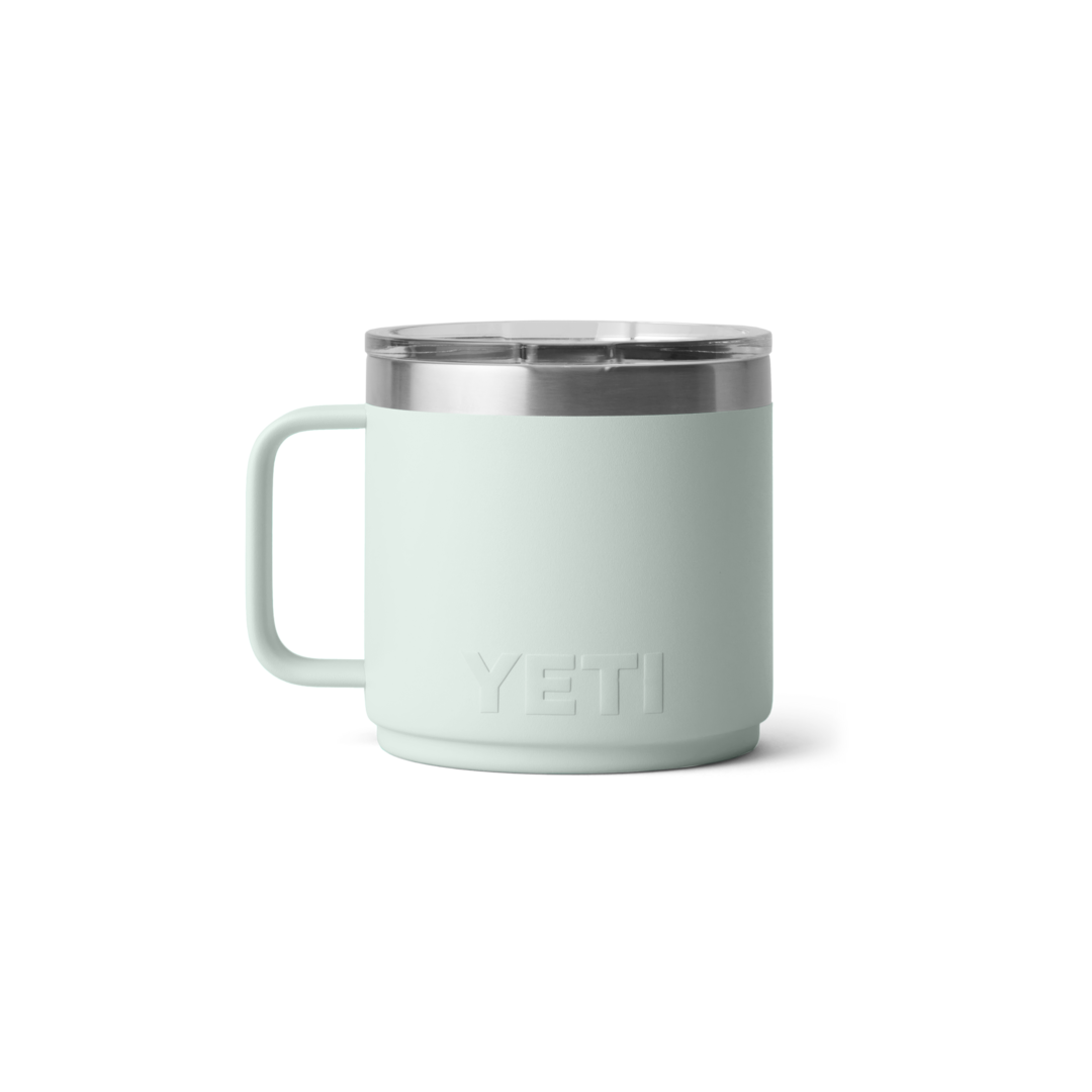 Light green 14 oz. stackable mug with ceramic lining and clear lid for hot and cold drinks in drinkware collections