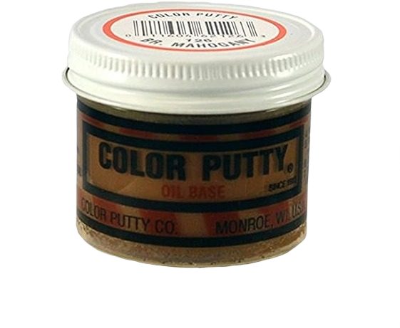 Small jar of brown mahogany oil-based wood filler for home improvement and woodworking projects